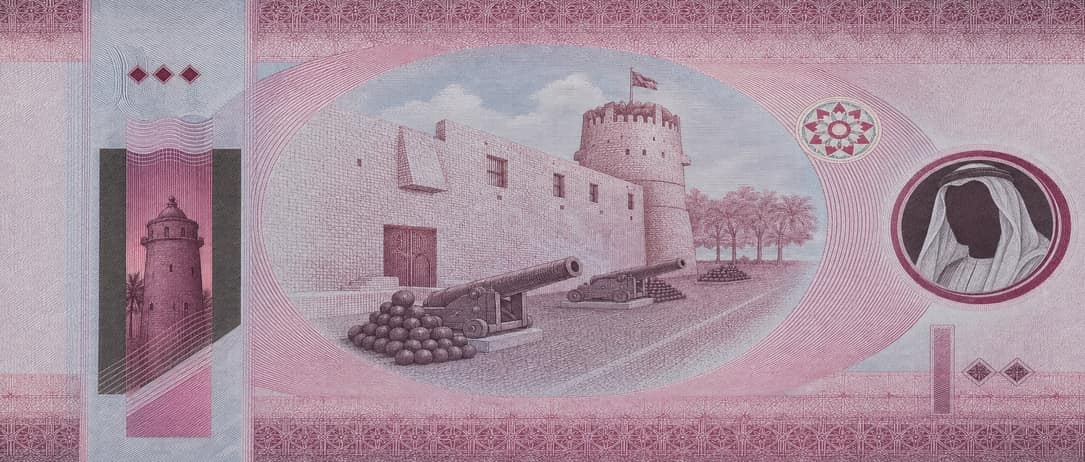 Illustration of a 100 AED banknote (UAE Dirham), featuring Umm Al Quwain National Fort.